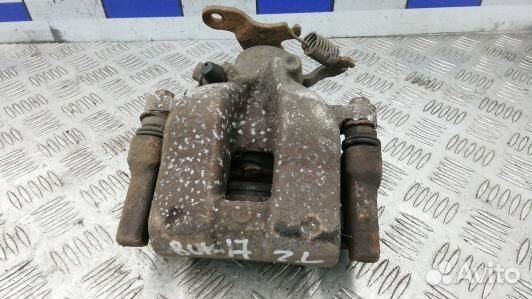 Суппорт тормозной задний левый toyota avensis T27