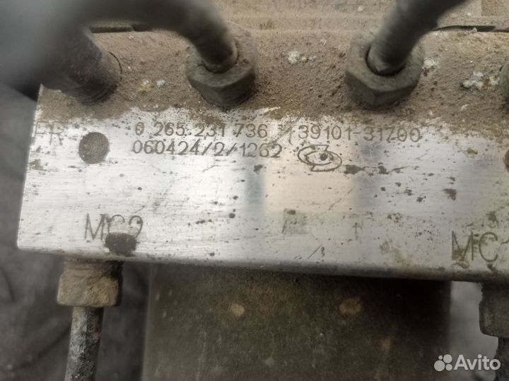 Блок ABS (насос) для Nissan Almera Classic B10