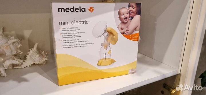 Молокоотсос medela электрический
