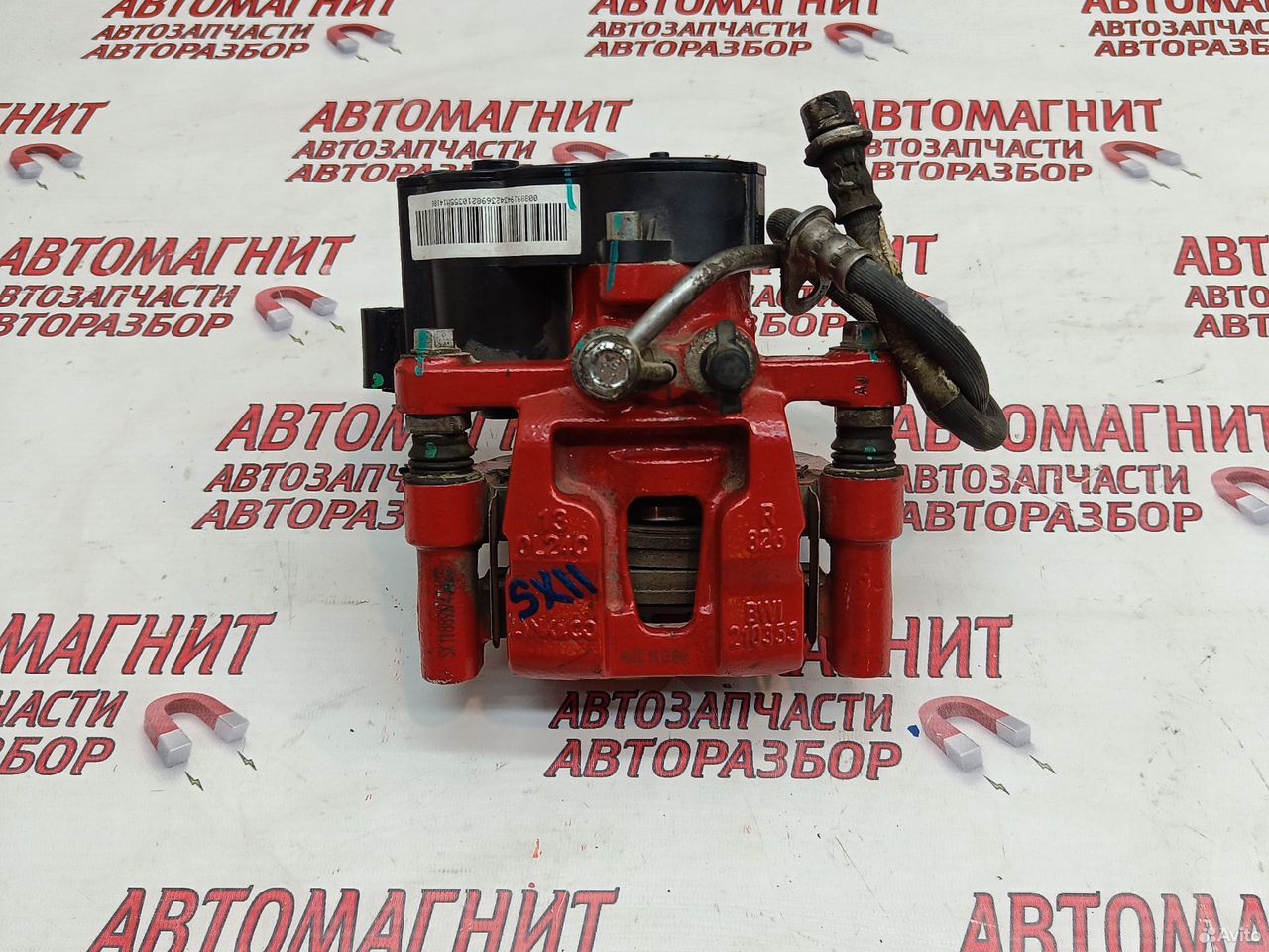 Супорт тормозной задний правый Geely Coolray SX11