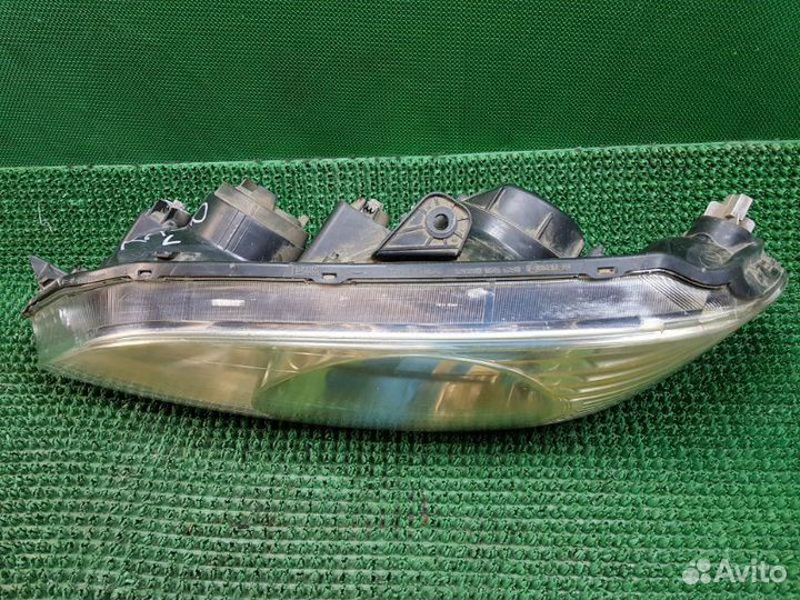 Фара передняя левая Honda Odyssey RA6 F23A