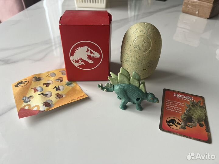 Игрушка динозавр jurassic world макдональдс