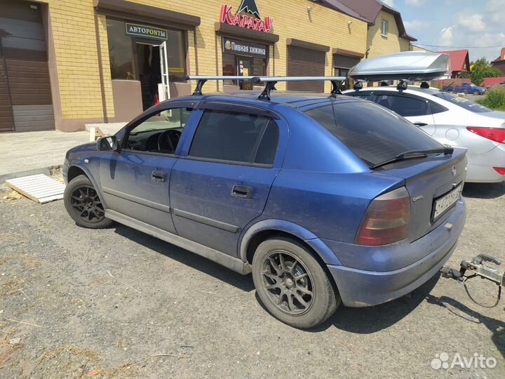 Багажник на крышу Opel Astra G аэро поперечины