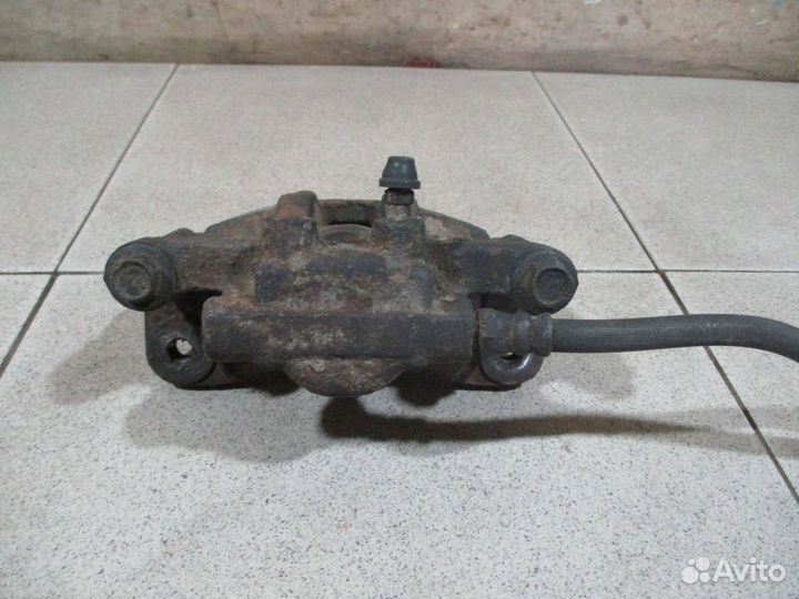 Суппорт задний левый Mitsubishi Lancer 10 (CY)