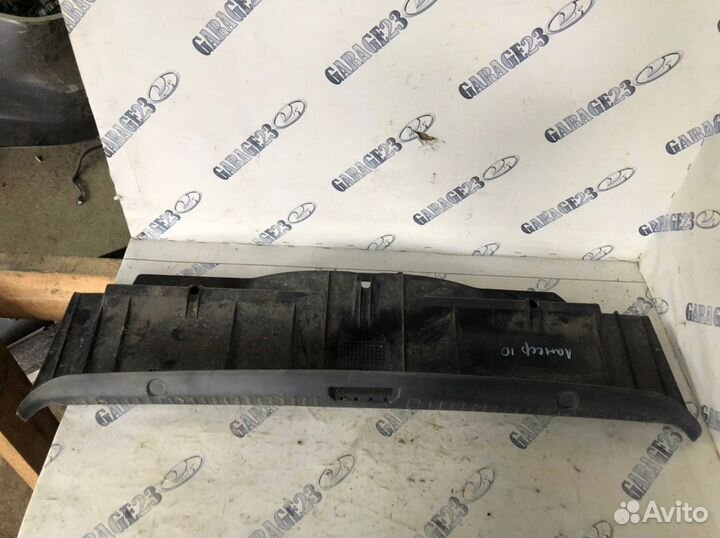 Обшивка на заднюю панель багажника Lancer 10