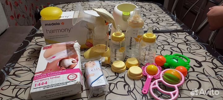 Молокоотсос и бутылочки Medela