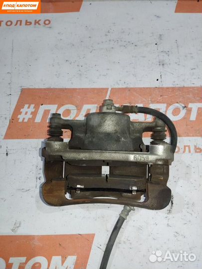 Суппорт тормозной передний правый Nissan X-Trail