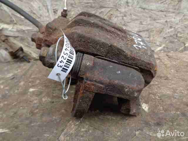 Суппорт передний правый Kia Sorento 2 XM