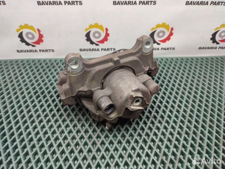 Суппорт тормозной передний правый Volkswagen