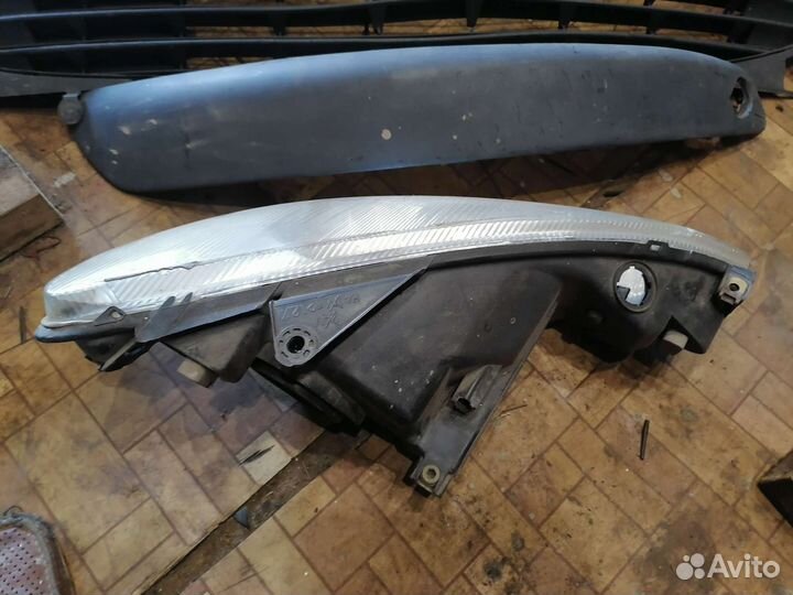 Фара левая на Peugeot 206