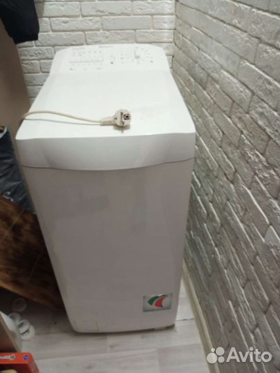 Стиральная машина с вертикальной загрузкой