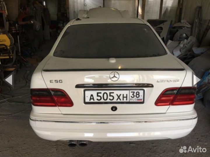 W210 E55 AMG спойлер (сабля)