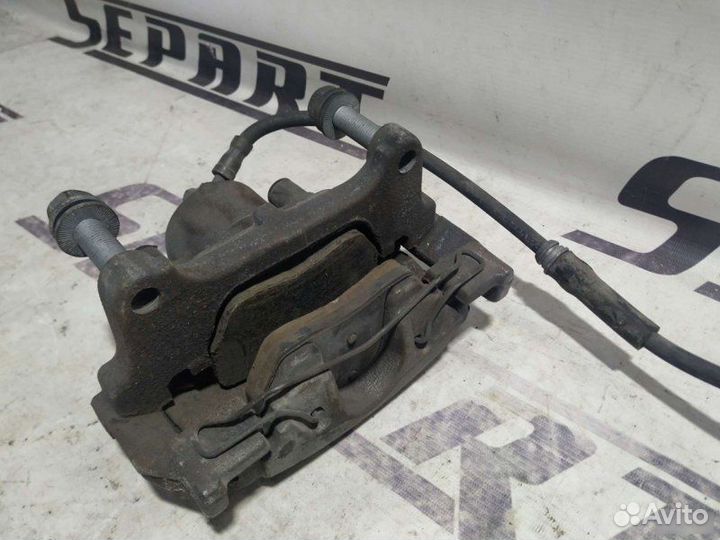 Суппорт передний правый Volkswagen Passat B7