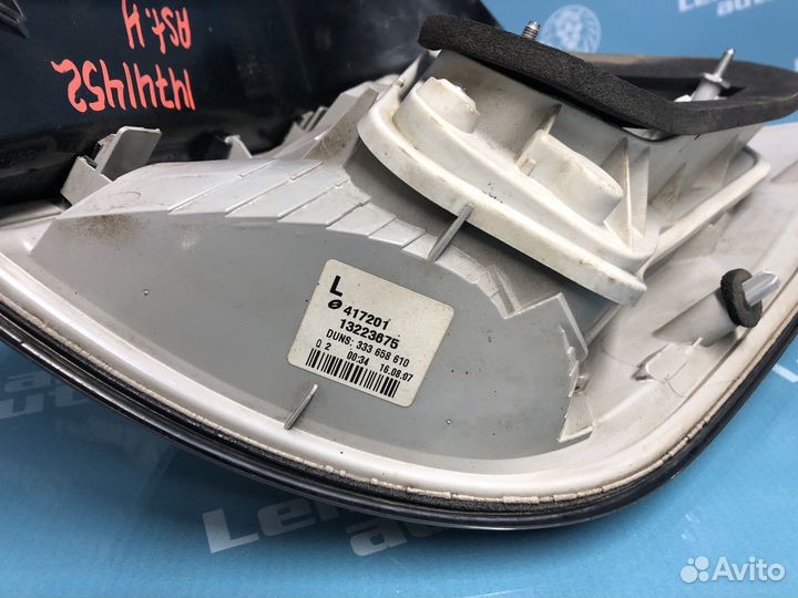 Фонарь задний левый Opel Astra H универсал