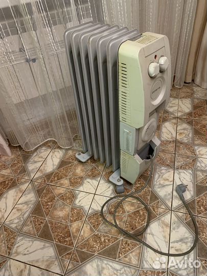 Масляный обогреватель