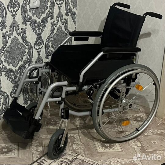 Инвалидная коляска