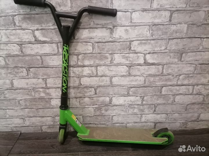 Трюковой самокат reaction