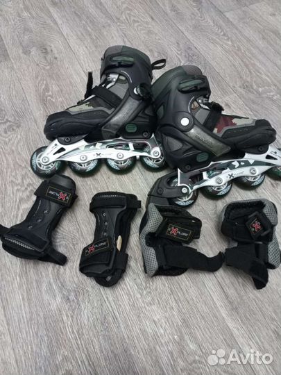 Роликовые коньки