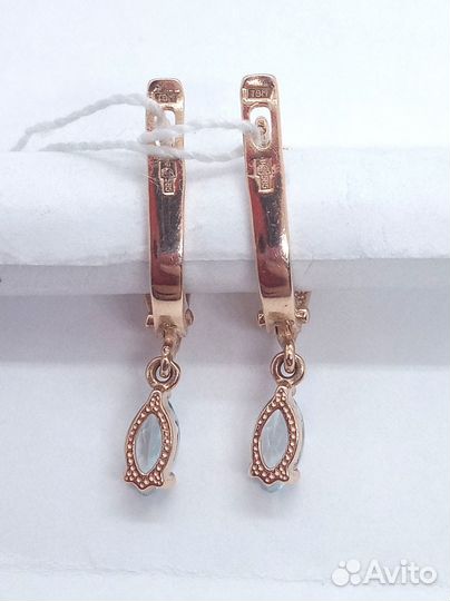 Золотые серьги с бриллиантом