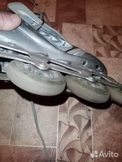 Роликовые коньки