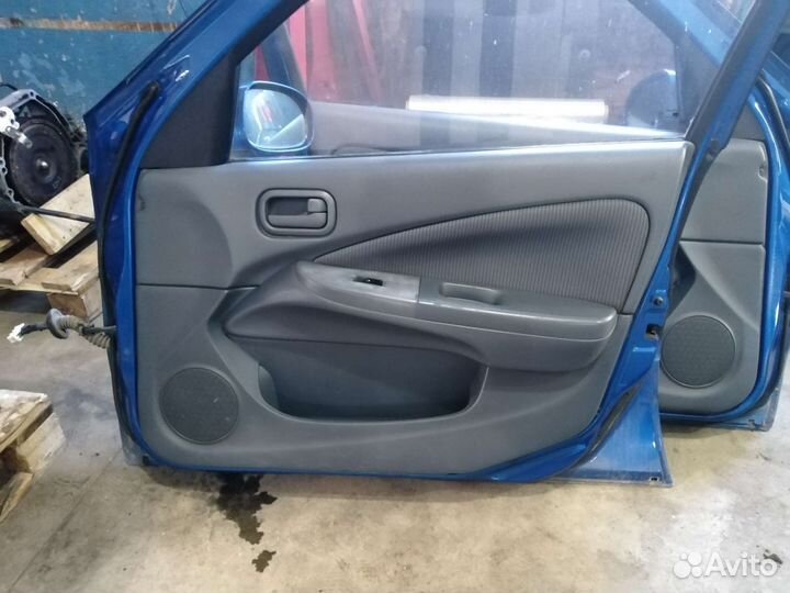 Обшивки дверей Nissan Almera Classic