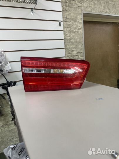Фонарь левый в крышку багажника Ауди А6 С7