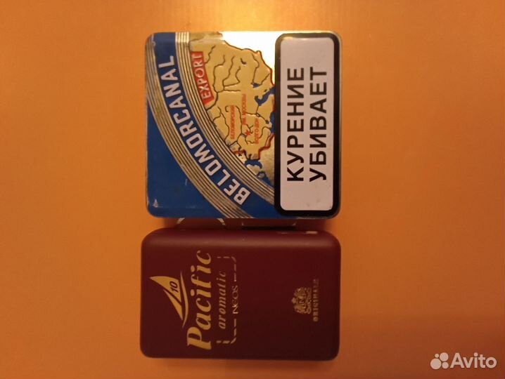 Коллекция пустых пачек металлических и картонных