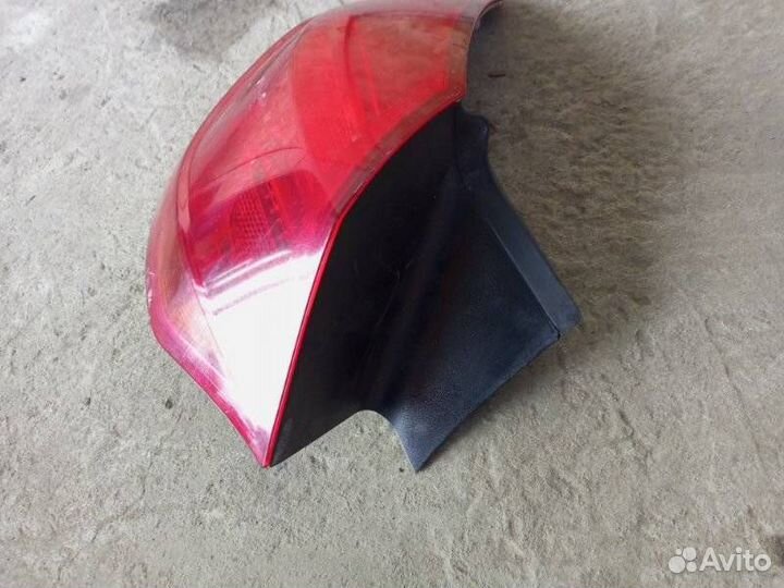 Фонарь задний левый Opel Astra 1222087 J