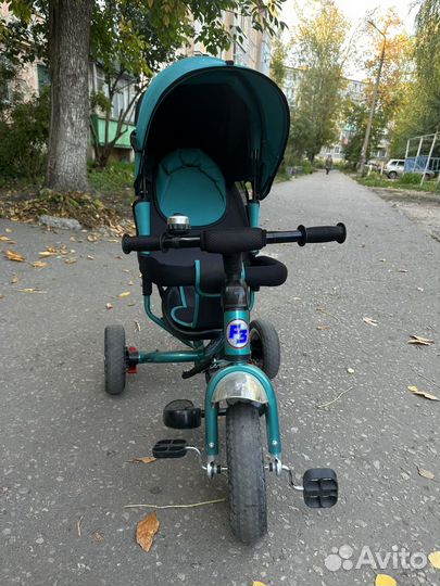 Трехколесный велосипед с ручкой