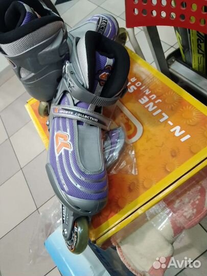 Роликовые коньки