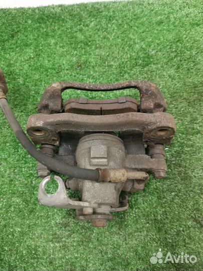 Суппорт тормозной задний левый Dodge Journey 2.4