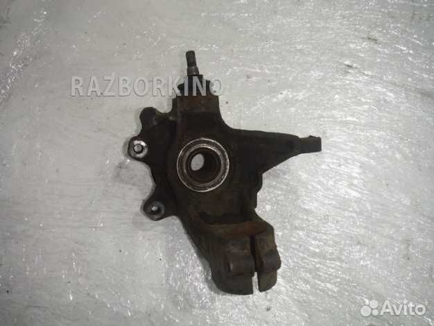 Кулак передний левый Пежо