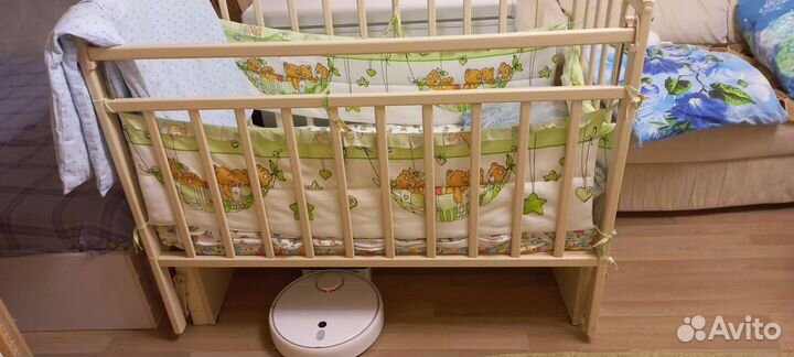 Детская кроватка с универсальным маятником