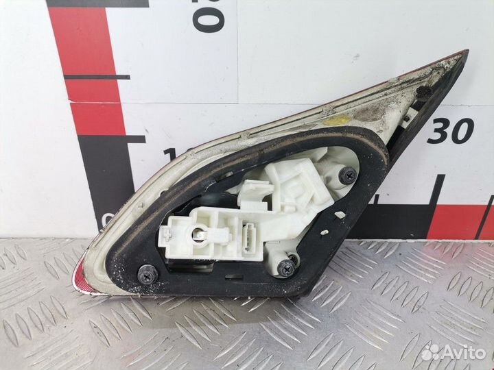 Фонарь крышки багажника левый Opel Astra