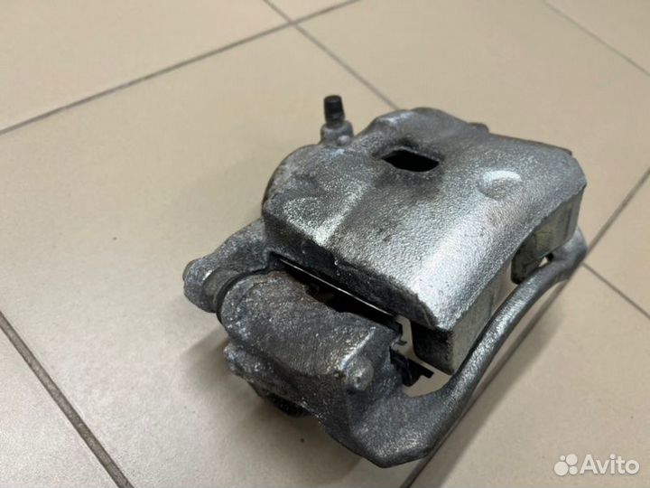 Суппорт передний левый Kia Cerato 28000 км 1.6