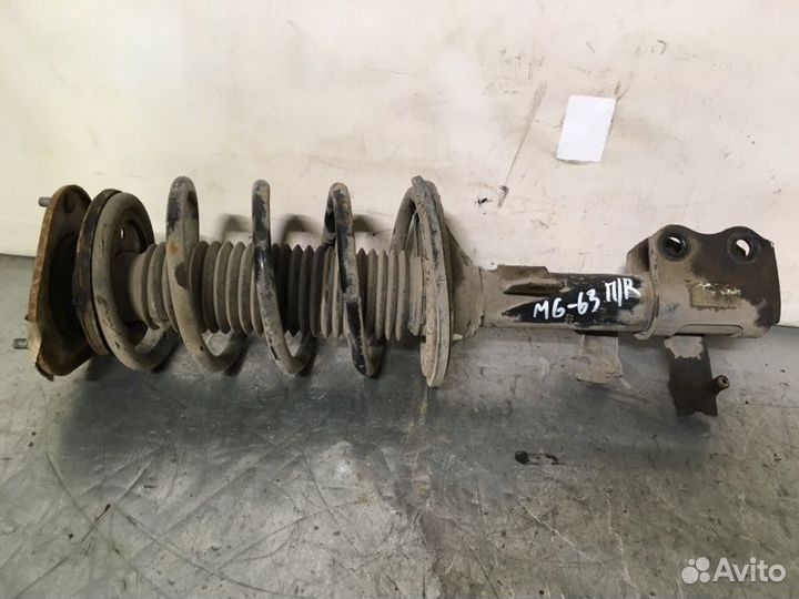 Стойка подвески передняя правая Geely Emgrand Ec7