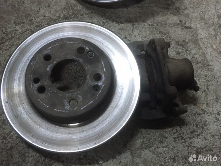 Суппорта передние с дисками w124