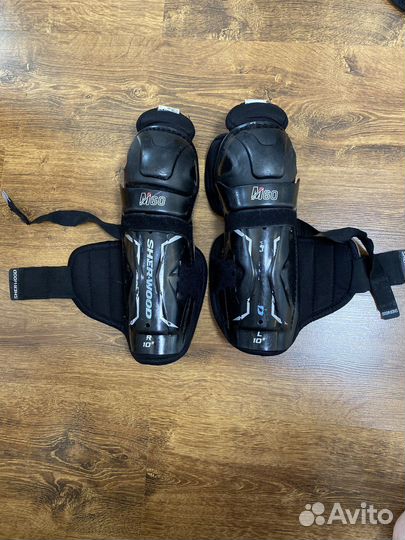 Щитки хоккейные 10