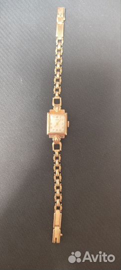 Золотые часы заря