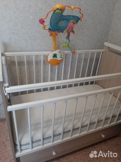 Музыкальная карусель в кроватку