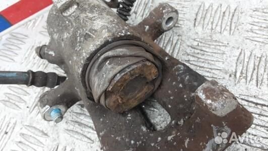 Суппорт тормозной задний правый opel zafira B (JDN