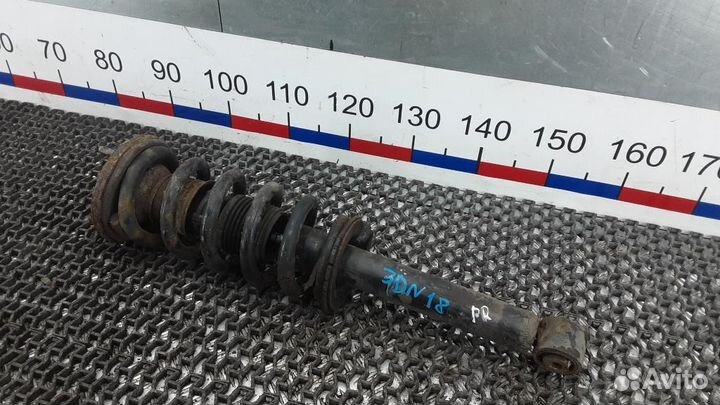 Стойка амортизатора переднего правого Mitsubishi M