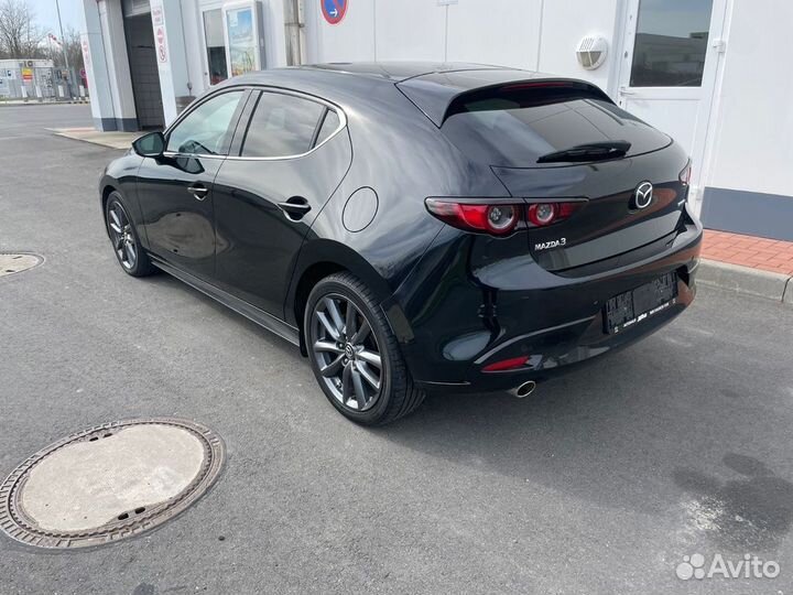 В разборе Mazda 3 BP