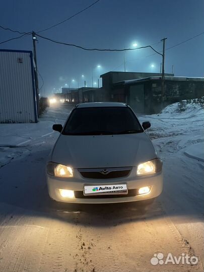 Mazda Familia 1.3 AT, 1999, 200 000 км
