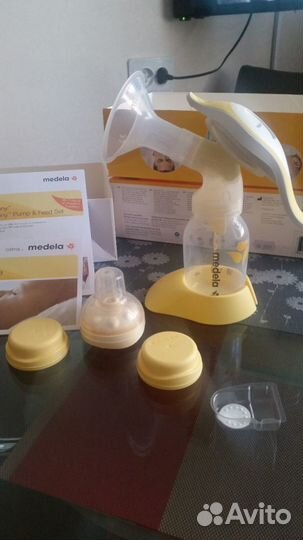 Молокоотсос medela