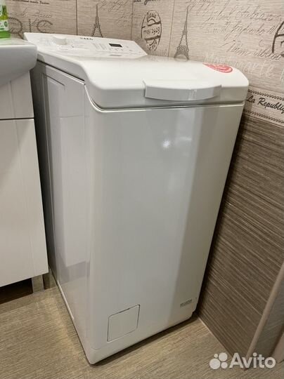 Стиральная машина с вертикальной загрузкой