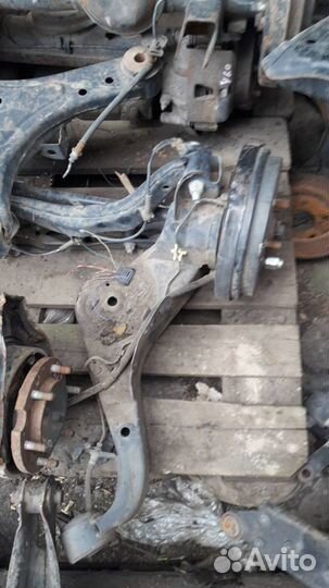 Задняя балка Nissan Lafesta