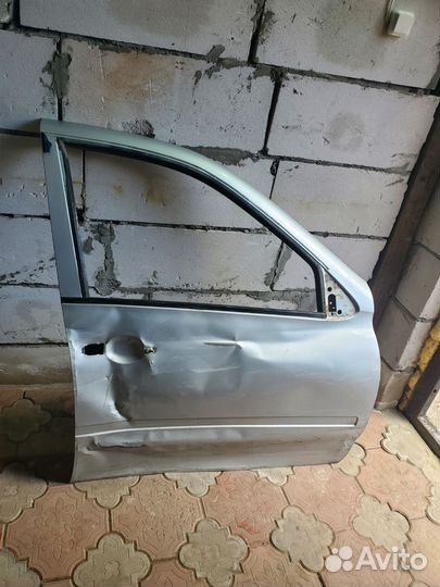 Дверь передняя правая на калину серебристый 2шт