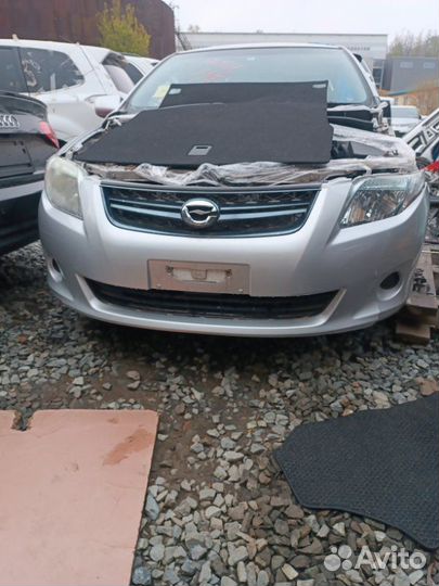 Бампер передний Toyota Corolla Fielder NZE144