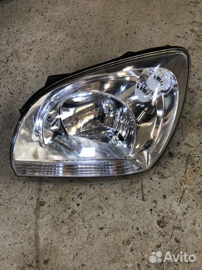 Фара левая Kia Sportage 2 2006